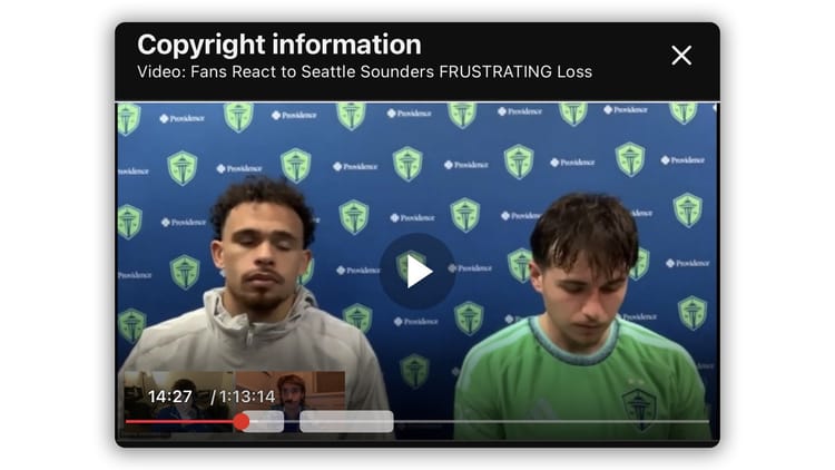 YouTube copyright information notice overlaying a video showing Seattle Sounders players Hassani Dotson (left) and Snyder Brunell (right) seated at a post-match press conference.